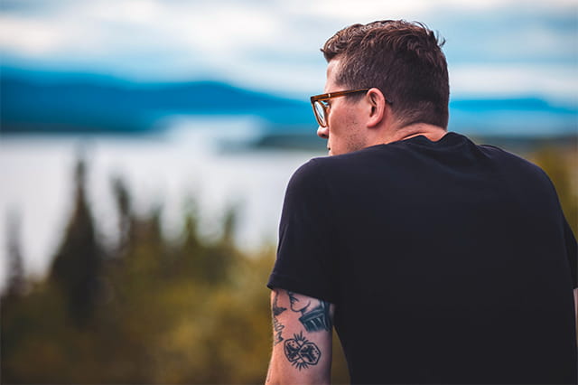 close up of man in black hoodie
