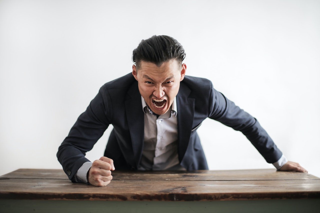 Executive yelling 10 Smart Ways To Handle A Toxic Boss