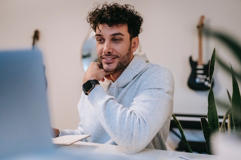 Photo of man smiling How Do You Know if He Is a Player