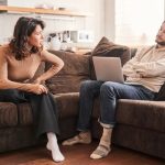 Unhappy Marriage Concept - A person holding a broken heart symbolizing the pain of staying in an unhappy marriage