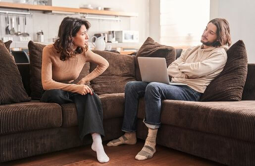 Unhappy Marriage Concept - A person holding a broken heart symbolizing the pain of staying in an unhappy marriage